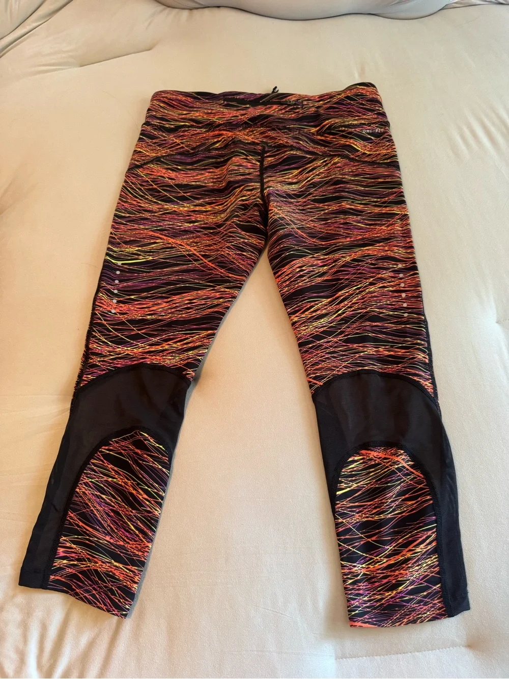 Nike Black Leggings with Neon Orange, Pink & Yellow Abstract Streaks